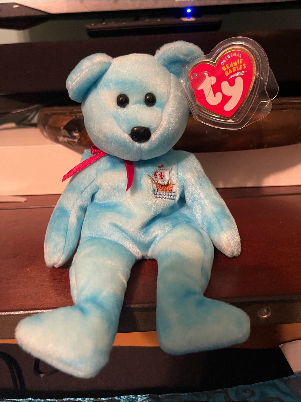 Ty Light Blue Beanie Baby Bear with Red Ribbon